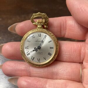 Arnex Gold tone Pocket Watch with Silver Face